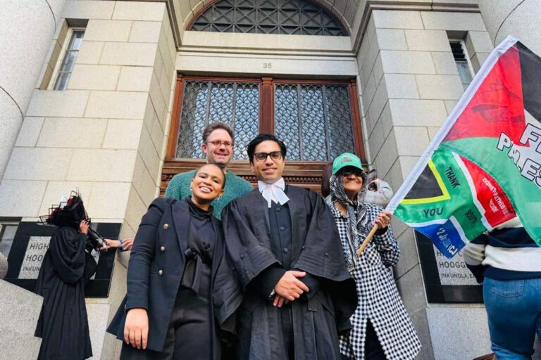 Noor-Banu Allie, 78, (right) has won a High Court battle to stay in her longtime home. Next to her is Adiel Nacerodien, on his right is Inga Dyantyi, and at the back is Jonty Cogger. Supplied/Ndifuna Ukwazi